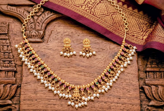 LAKSHMI RUBY-GREEN PEARL TEMPLE SET